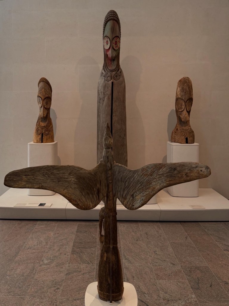 Foreground: Finial for a ceremonial house, Sawos artist; Kaimbiam village, Middle Sepik River, Papua New Guinea
Background: Finials from Ambrym Island artists; Fanla village, Vanuatu